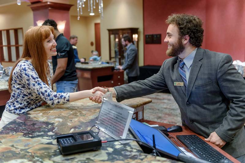 MTSU Tourism and Hospitality students in training at a hotel